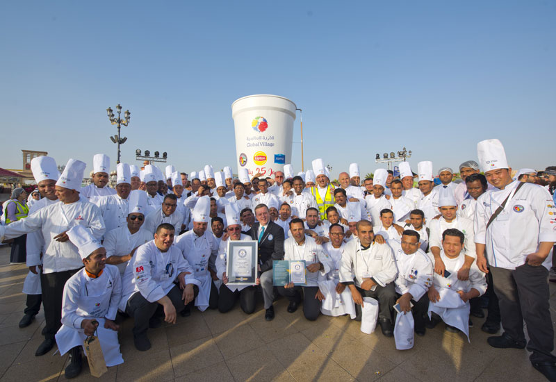 Members of the Emirates Culinary Guild teamed up with Global Village and Mindset to prepare the largest cup of hot tea in the world.